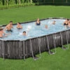 BESTWAY Power Steel Pool, Holz-Optik (dunkelgrau), TriTech, 732x366x122cm, Oval, Mit Filterpumpe, Leiter, Abdeckplane -Gartenmöbel 1 21942.jpg